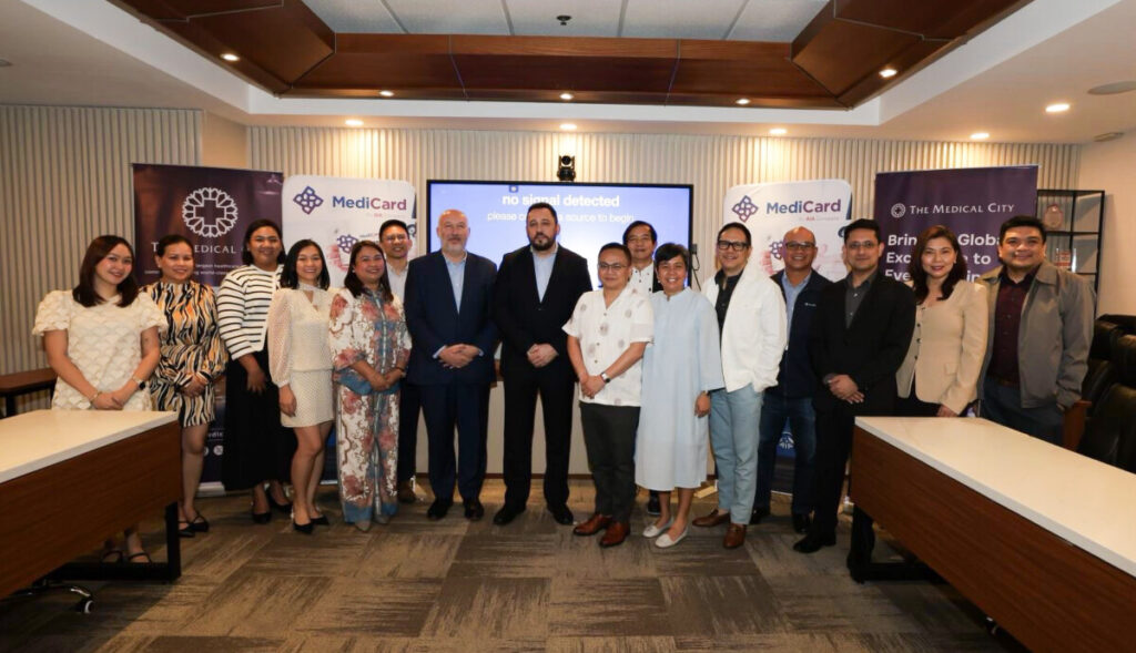 MediCard and The Medical City executives and staff in a group photo at the partnership event